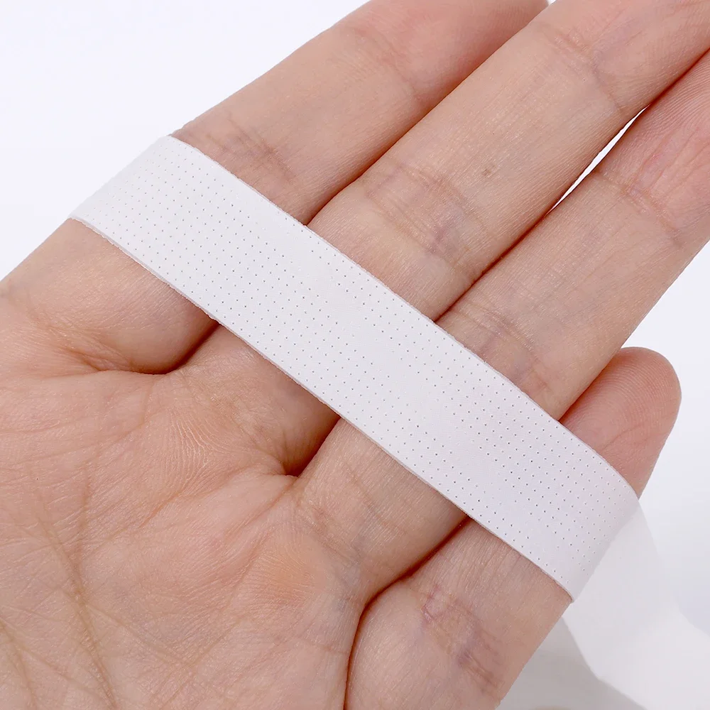 Nastro adesivo per Extension ciglia nastro adesivo in tessuto Non tessuto traspirante sotto gli occhi nastro di carta per ciglia finte Patch strumenti per il trucco