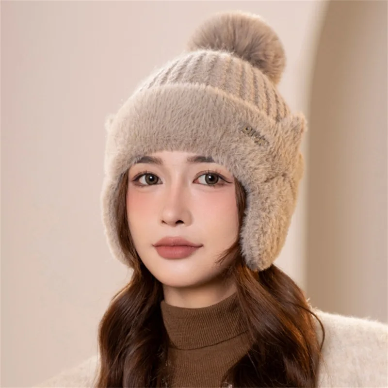 

Winter new style spliced mink velvet earmuff woolen hat for women. Korean fashion, solid color and simple, pompom knitted hat.