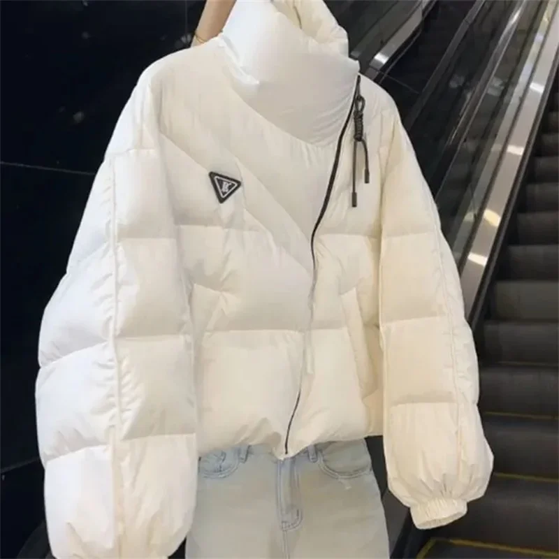 

2025 зимняя новая хлопковая куртка, женская корейская свободная утепленная куртка с воротником-стойкой, женская однотонная повседневная короткая верхняя одежда, топ