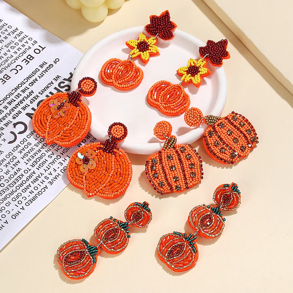 

Rice bead earrings Fabric Flowers Pumpkin Creativity Bohemia Pattern Hand weaving Alloy Female Fashion Simple Beaded earrings