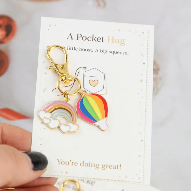 10/14pcs 2dInteresting hot air balloon paired with rainbow series keychain set Comes with pocket-sized greeting card Actively su