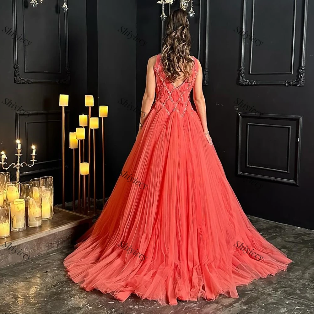 Elegant A-line Tulle Evening Dress with Sparkly Beading Sequined V-Neck Formal Prom Gowns Sleevless Sweep Train Celebrity Gowns