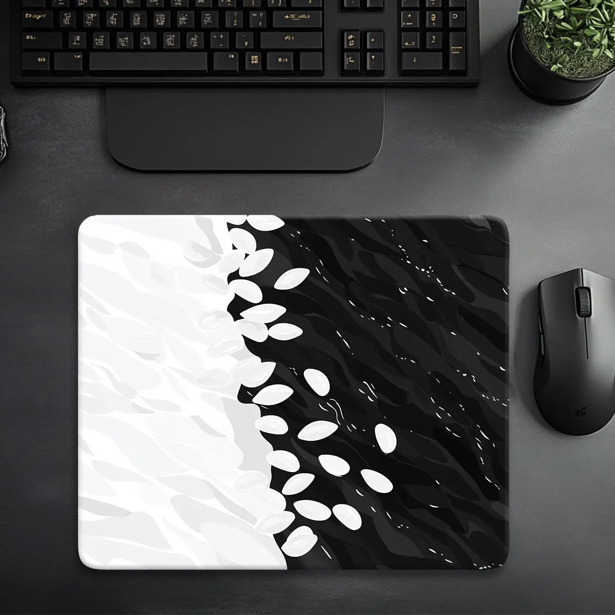

The black and white monochrome mouse pad with an anti-slip rubber base is washable and suitable for both home and office use