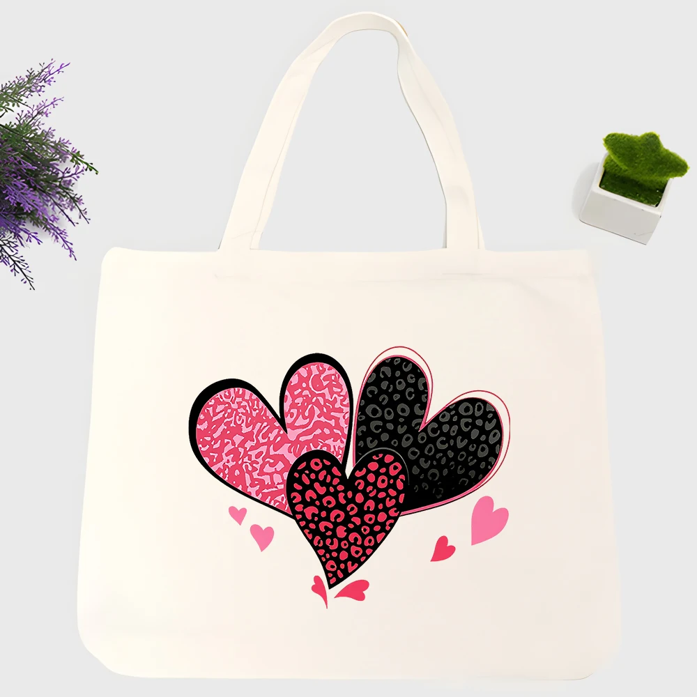 Women's heart print canvas tote bag with animal pattern, casual style for daily shopping and weekend outings