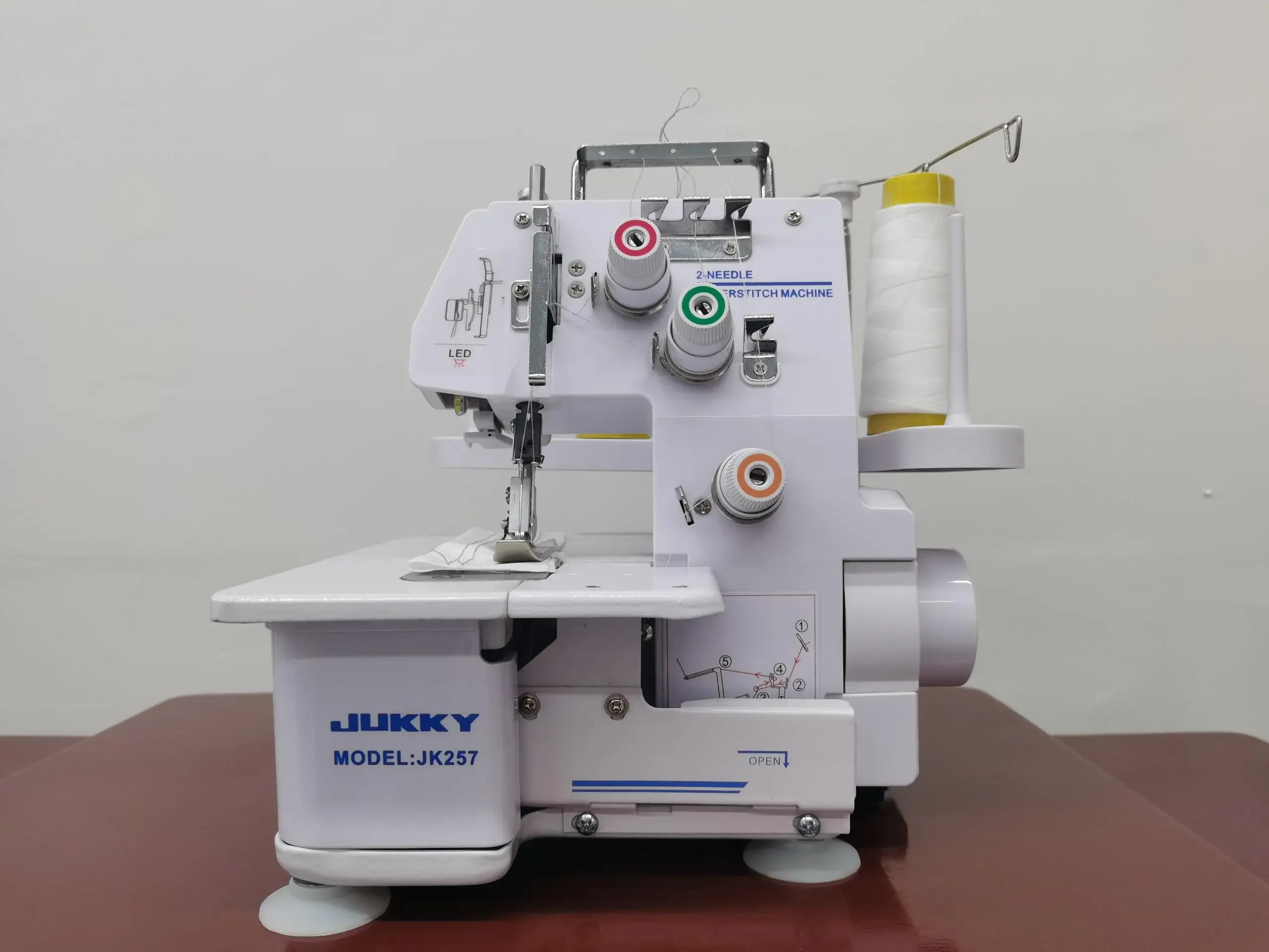 JK-257 Mini Household 3-Thread Overlock Sewing Machine New Condition ABS Material Built-in Motor Manual Feed Mechanism Garments