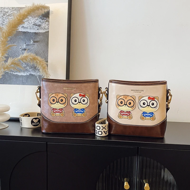 

Beibaobao New Commuter Bucket Bag Women's Cartoon Cat Style Crossbody Bag Single Shoulder Women's Bag Large Capacity Handbag