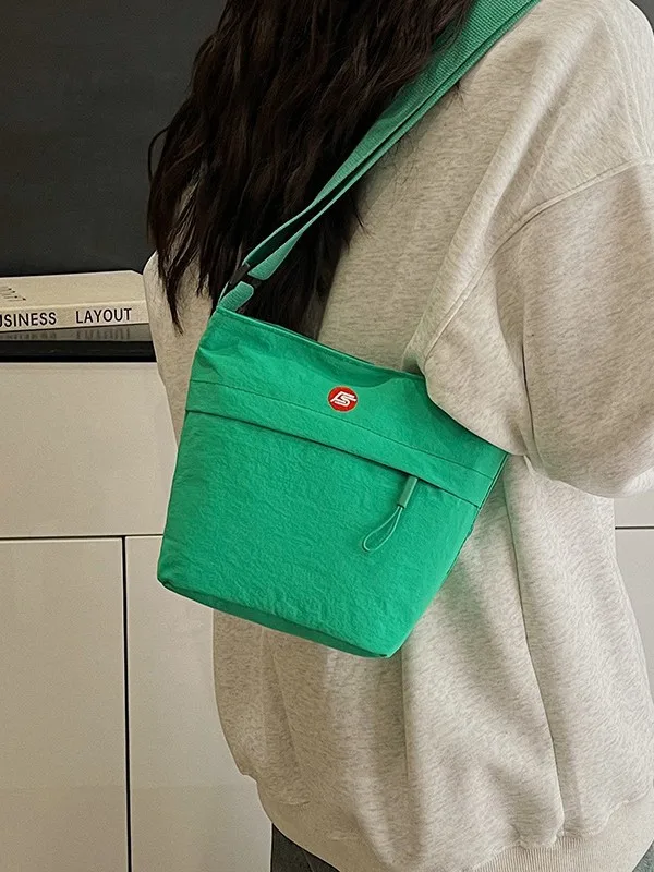 

2025 Spring/Summer New Arrival - Color Casual Embroidery Bucket Bag. Simple Oxford Cloth, Fashion Oblique Shoulder Style