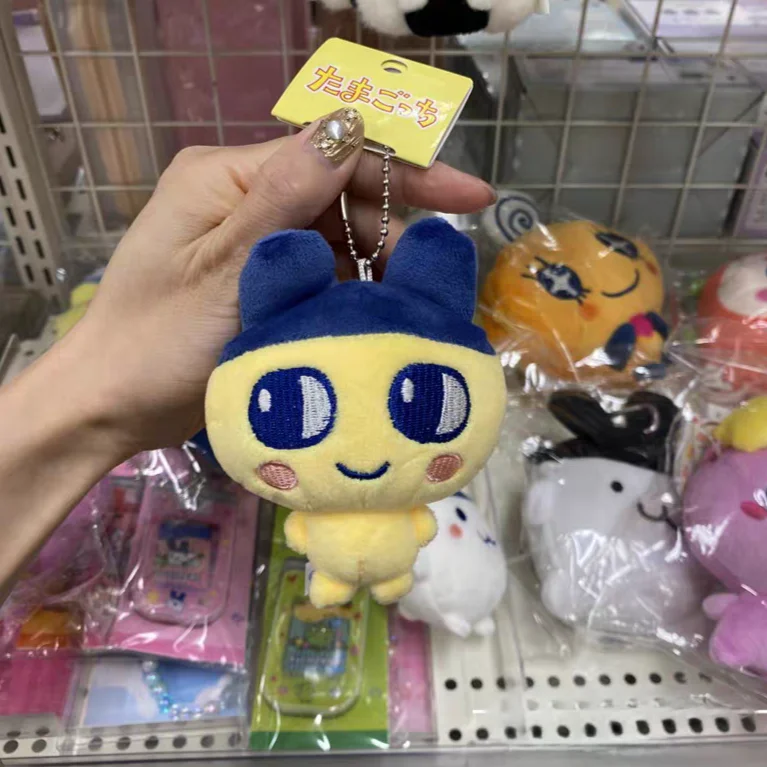 Tamagotchi llavero de juguete de peluche colgante lindo Kawaii Mametchi Mimichi Kuchipatchi accesorios de funda de tarjeta de Animal relleno
