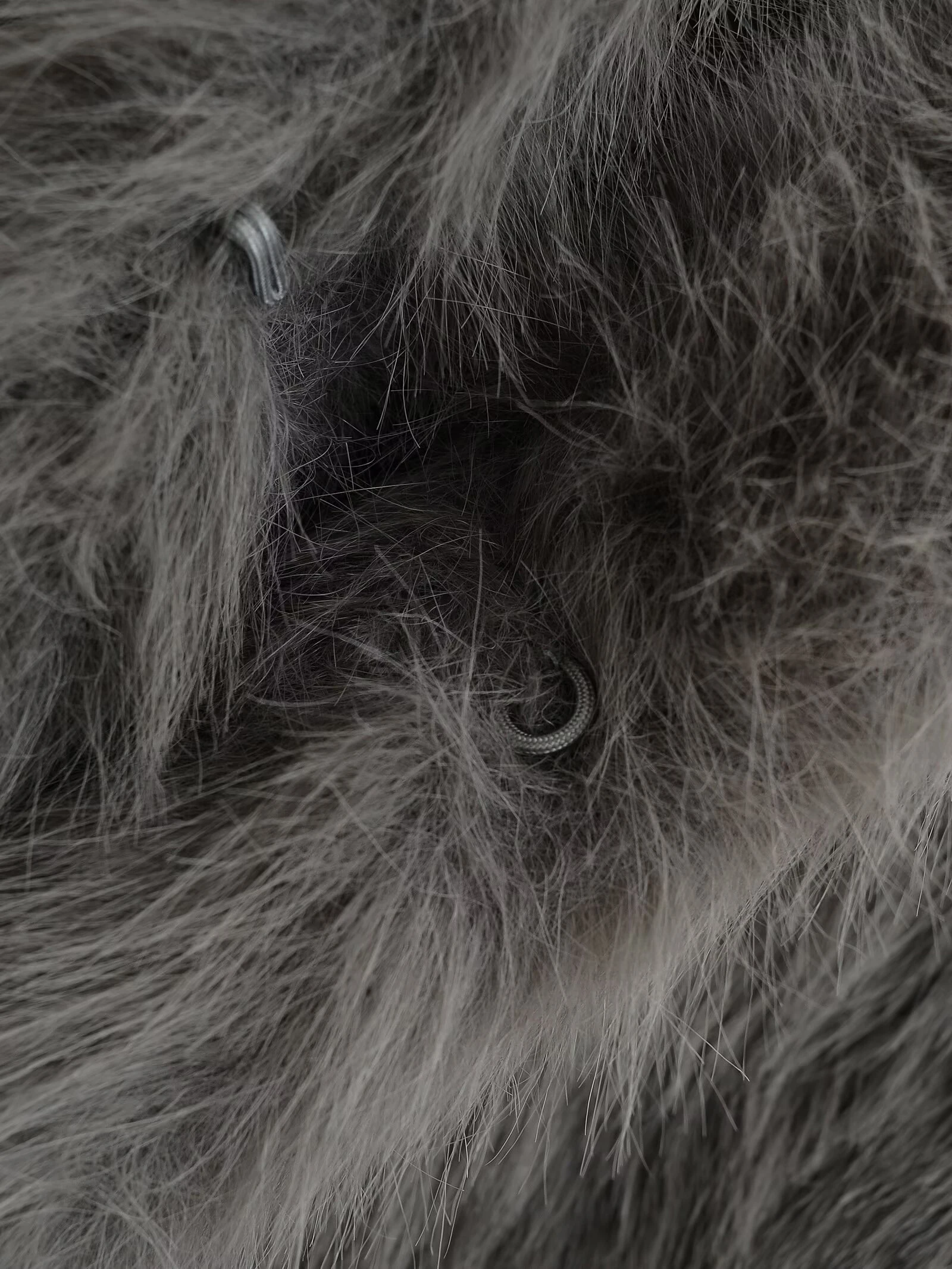 Ropa de mujer de estilo europeo y americano nueva chaqueta corta con efecto de piel artificial de invierno 2025