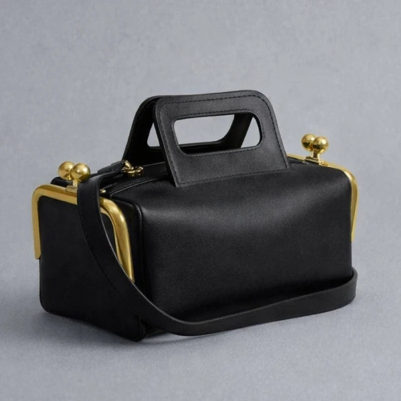 

Luxury Designer Retro Versatile Pillow Shape Zipper Clip Handbag 2026 New Two Side Clamp Design Frame Kiss Lock Bag for Women