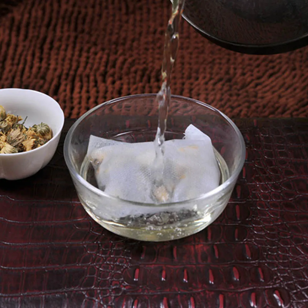Bolsas de filtro desechables para Infusor de té, bolsitas de tela no tejida de calidad alimentaria, para hierbas y té, 100 piezas