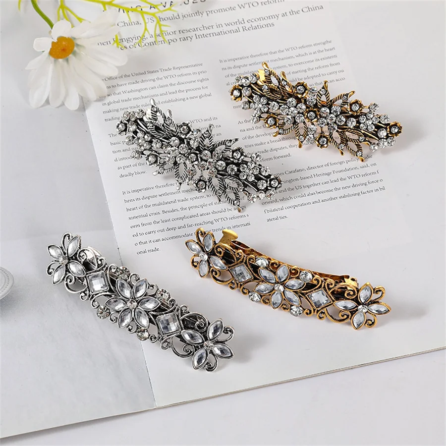 The new Korean version of the crystal flower spring hairpin elegant rhinestone wild ponytail hairpin women\'s hair accessories