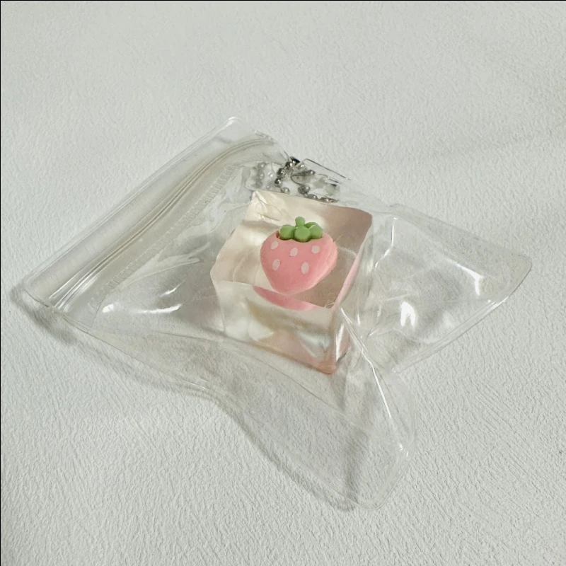 アイスキューブ＆フルーツスクイーズキッズドールキーホルダー - 鼻くそ型ストレス解消おもちゃ、ゆっくり戻る必須アイテム