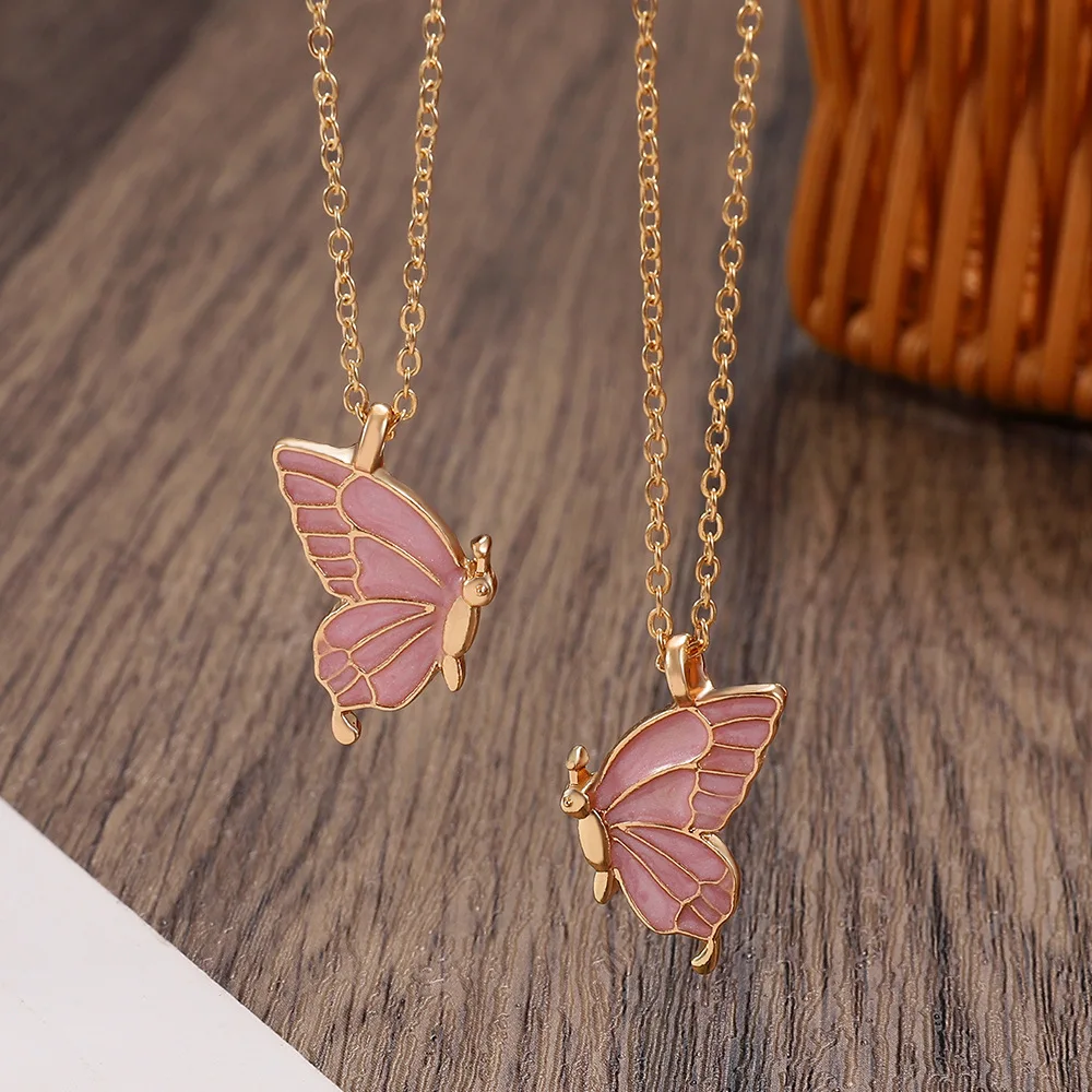 Collier double papillon goutte d'huile, ensemble d'amitié papillon créatif, chaîne de clavicule, cadeau pour petite amie