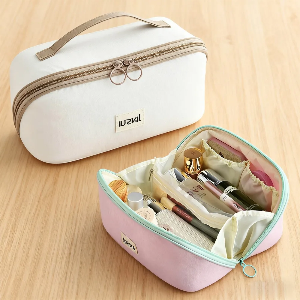 

New style fashionable hand-held toiletry bag pillow cosmetic large capacity light luxury high end portable travel cosmetic bag