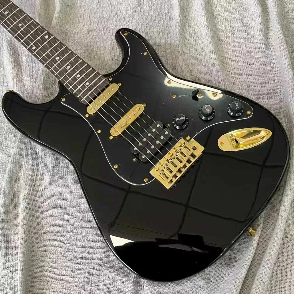 

Горячая новинка 2026: Черная гитара с накладкой грифа из палисандра, золотой фурнитурой и синхронизированным вибратором
