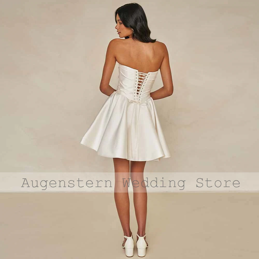 Charmante korte bruidsjurken satijn a-lijn bruiloft jurken ivoor strapless ruches plooi kant-up trouwjurken dames