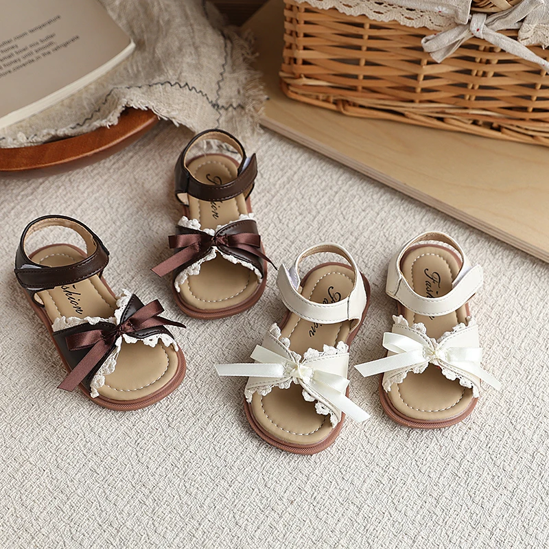 

Детские сандалии для девочек с кружевной отделкой и бантом, летние, 2026, с открытым носком, повседневные, на мягкой нескользящей подошве