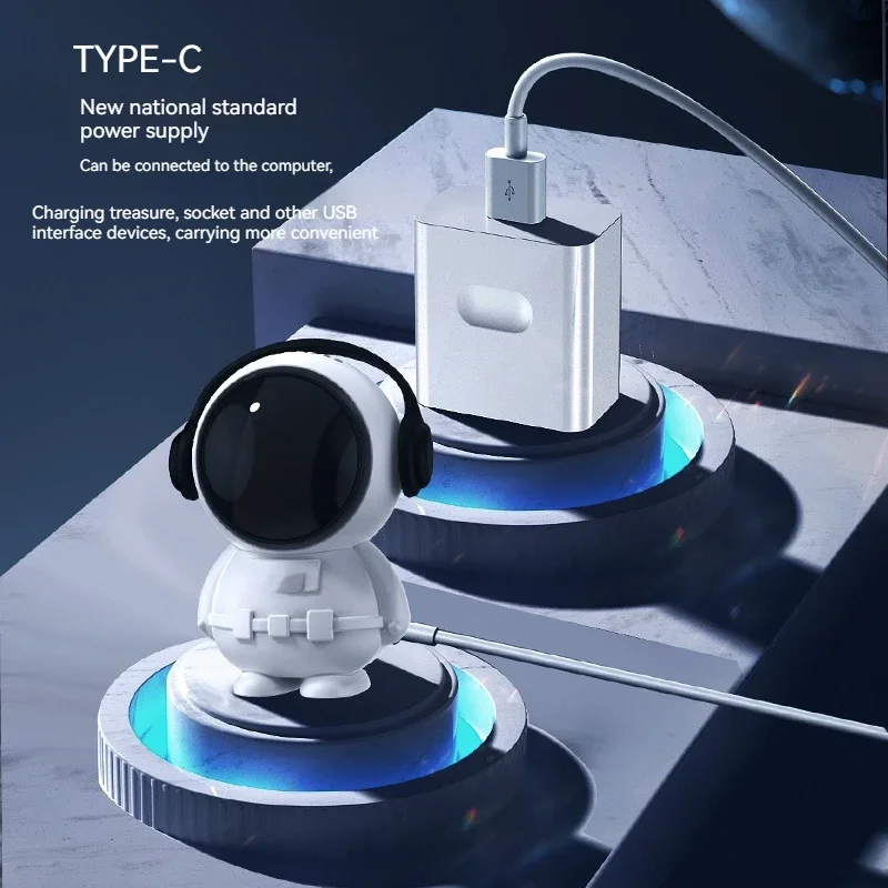 مروحة محمولة معلقة على الرقبة لرائد الفضاء كارتونية صغيرة عبر الحدود محمولة بدون أوراق شحن مروحة USB تصميم بدلة الفضاء ماتر بلاستيكي