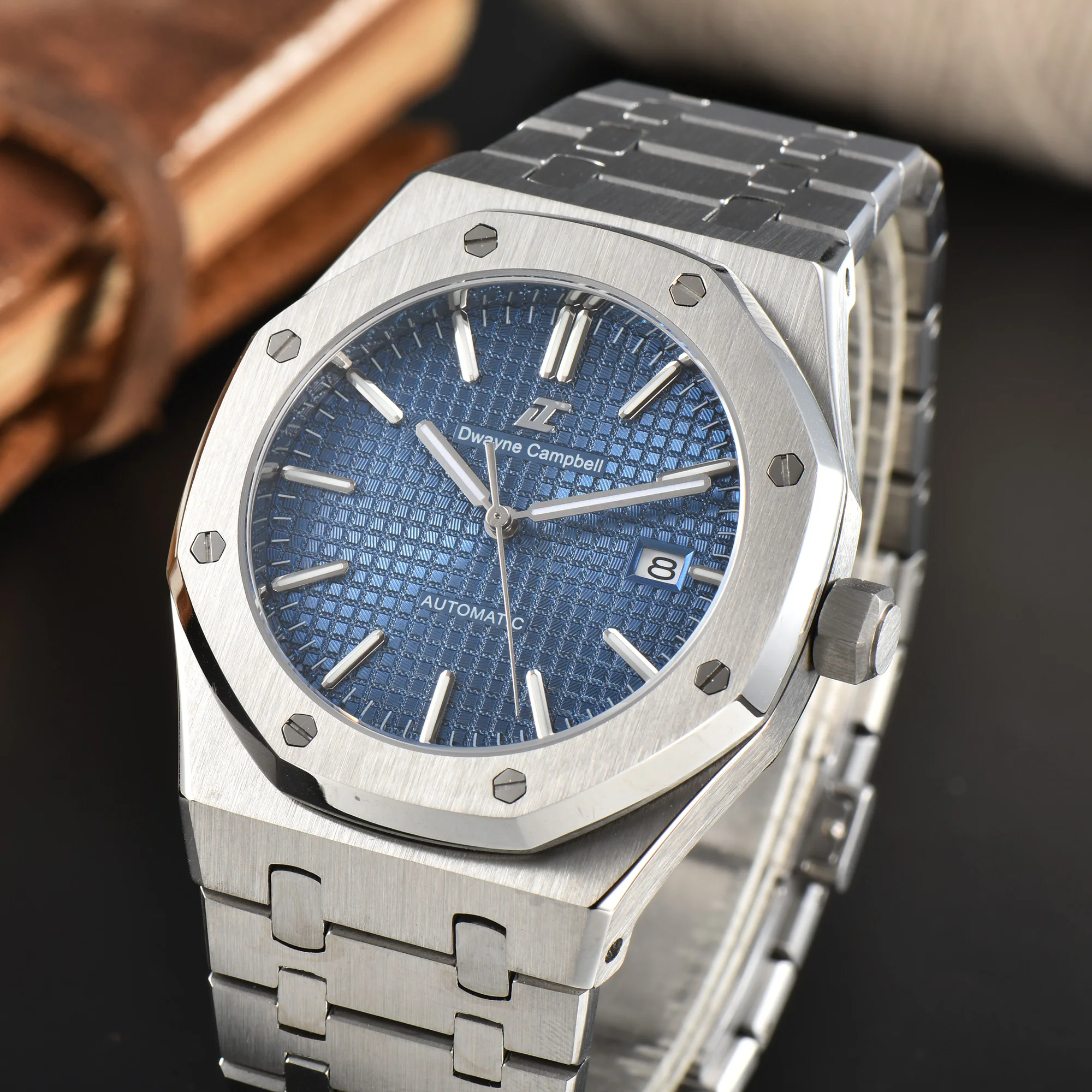 Fully automatic mechanical watch with NH35 movement, stainless steel strap, water-resistant, and sapphire glass watch face.