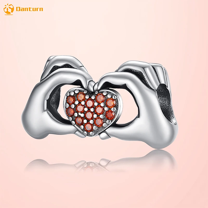 

Danturn 925 Sterling Silver Beads Hold a heart in one's hands Dangle Charm fit Snake Chain Bracelet Fashion Women Jewelry Making