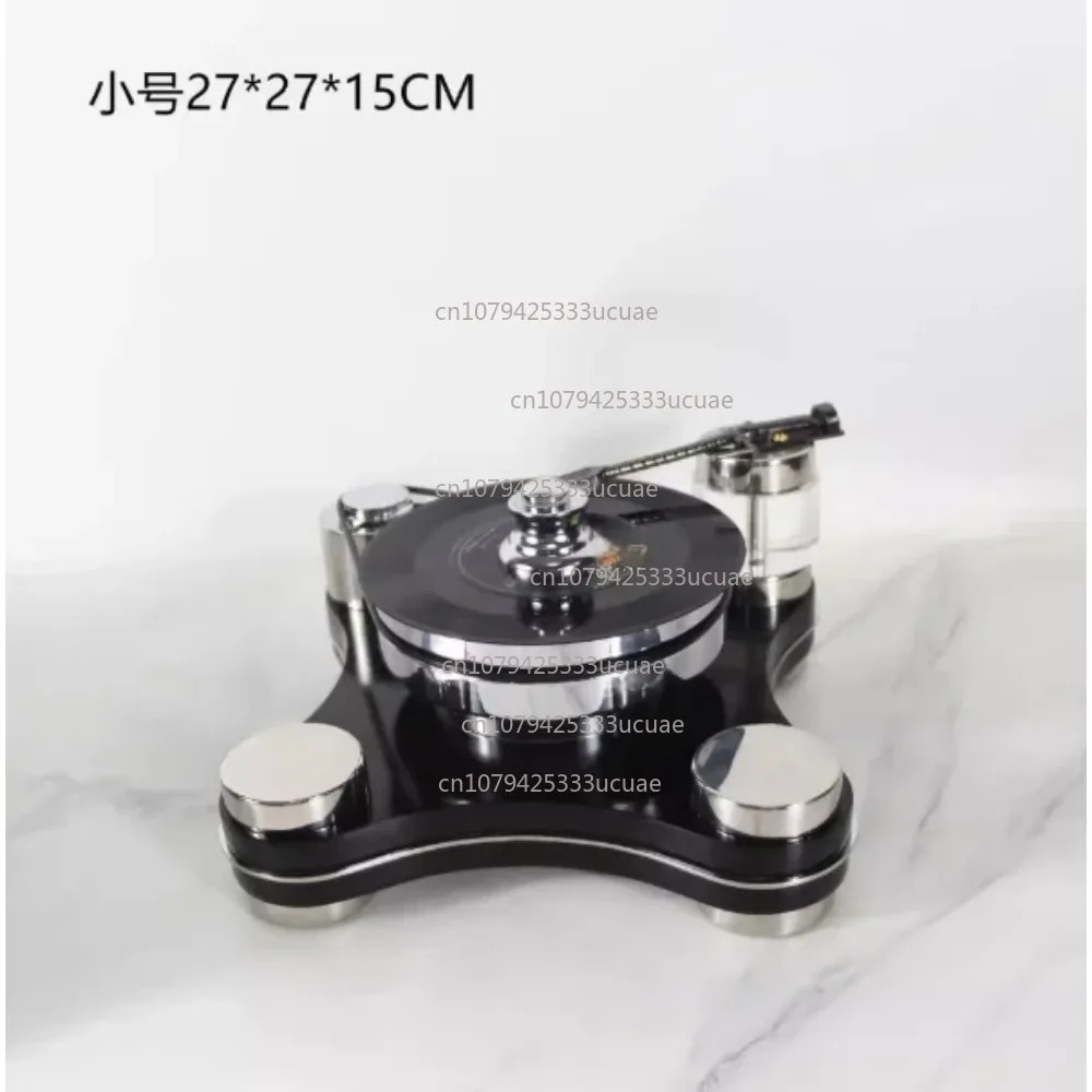 Black minimalist stainless steel vinyl record player turntable with wood grain effect for family hotel club decor