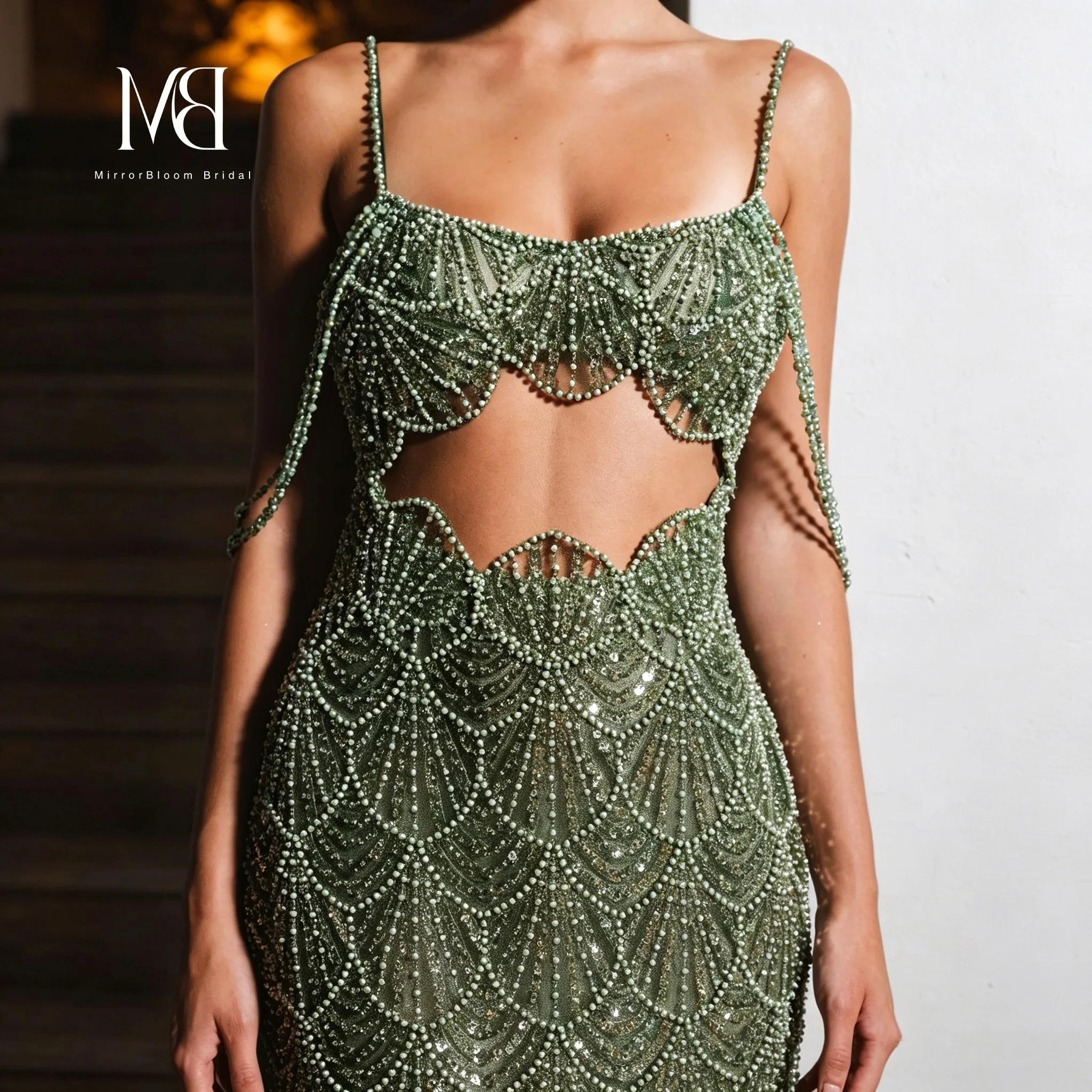 Green strapless halter-neck fish tail and floor-length formal evening dress with sequins and exposed midriff