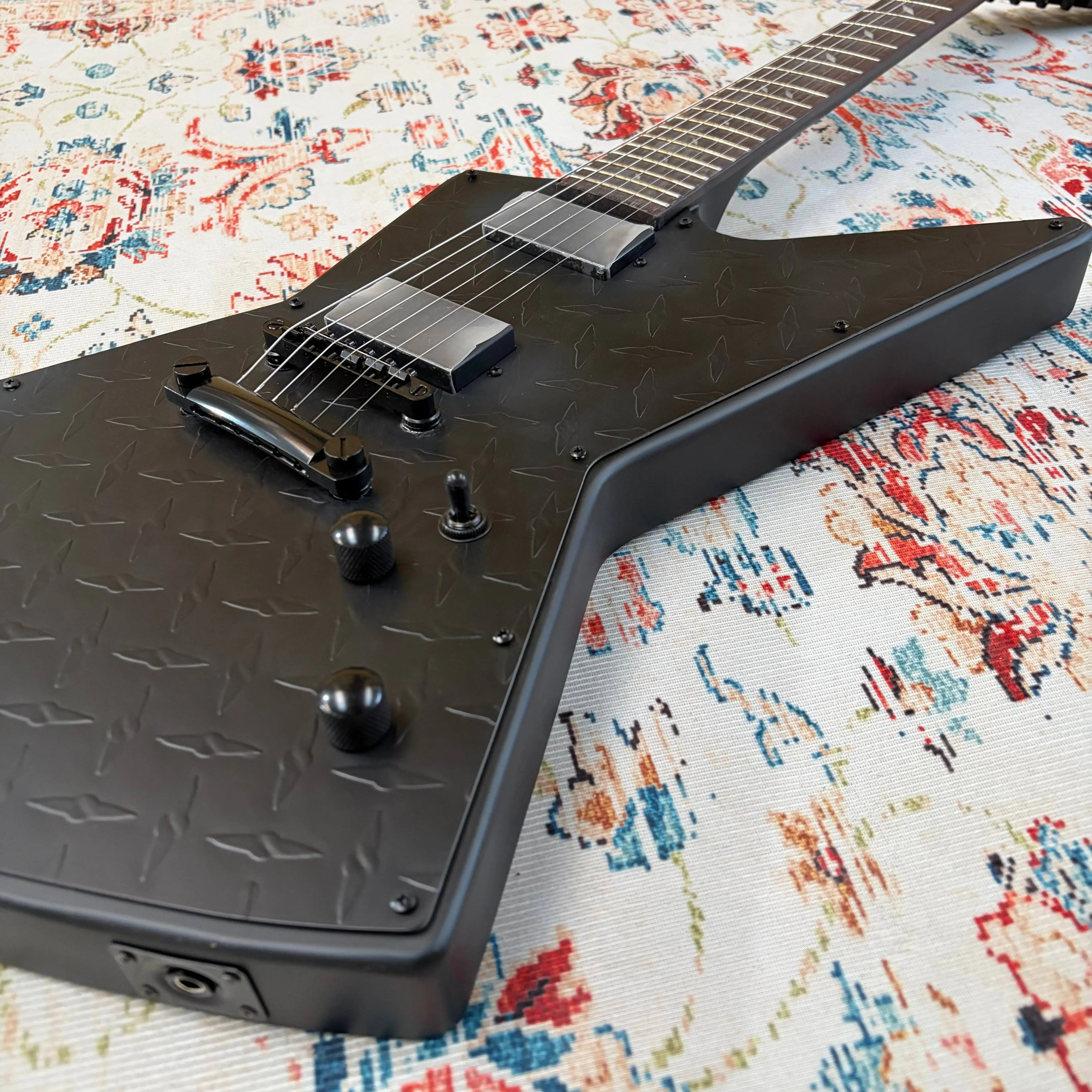 

Diamond Plate Electric Guitar Black Embossed Metal Panel Diamond Inlays HH Humbuckers Fixed Bridge Mahogany Neck Rosewo