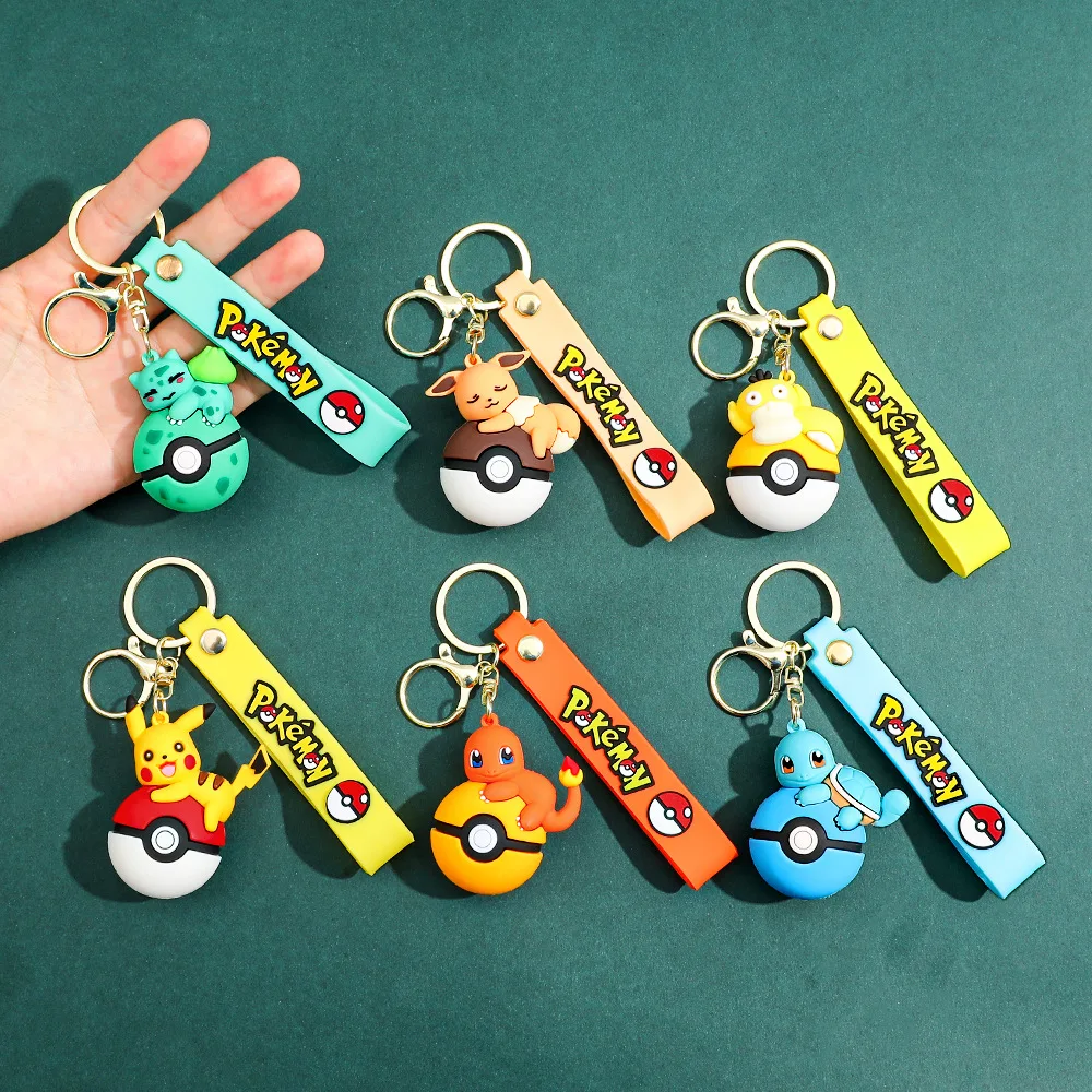 

Anime Pokémon Ball Keychain PVC Pikachu Squirtle Eevee Bulbasaur Charmander Psyduck Collectible Keychain for Car Key Bag Charm