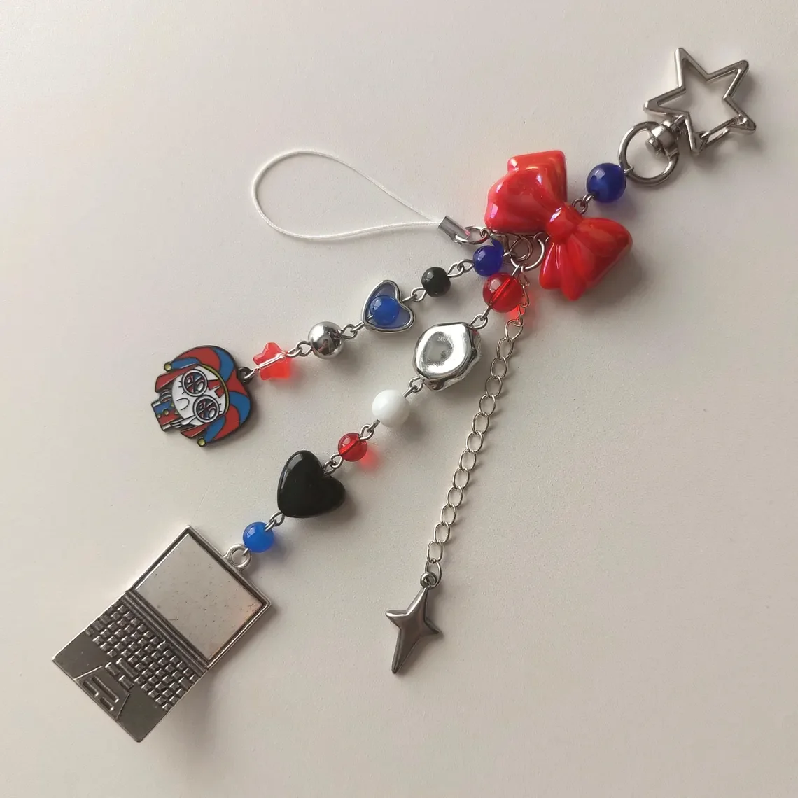 السيرك الرقمي المذهل، سلسلة مفاتيح جاكس، سلسلة مفاتيح بومني TADC، سحر الحقيبة