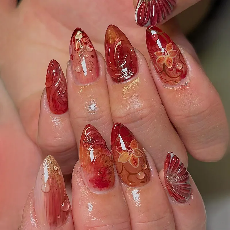 

24pcs Orange-Red Vintage Style Press-On Nails with Glitter Floral Accents, Medium Long Oval Shape, Assorted Sizes