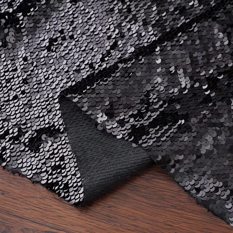 black sequin dress material Amazon.com: PATYDEST Black Sequin Fabric Sparkly Fabric by the Yard 1 Yard Big Payette Sequin Fabrics Mermaid Sequin Flip Fabrics Reversible Sequin Velvet Stretch Fabriced Material for Sewing Dress Making