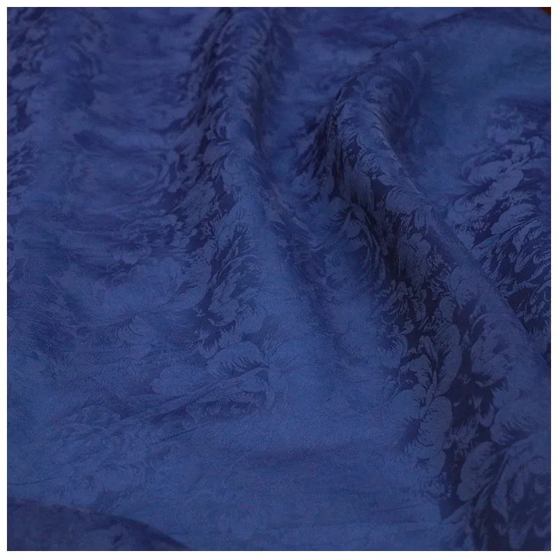 This is a designer fabric for new Chinese-style cheongsam made with traditional plant-dyed indigo silk jacquard