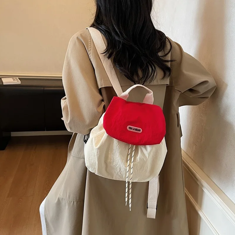 2026 New Four Seasons Pass Versatile Casual Fashion Simple Letter Contrasting Color Drawstring Women's Backpack