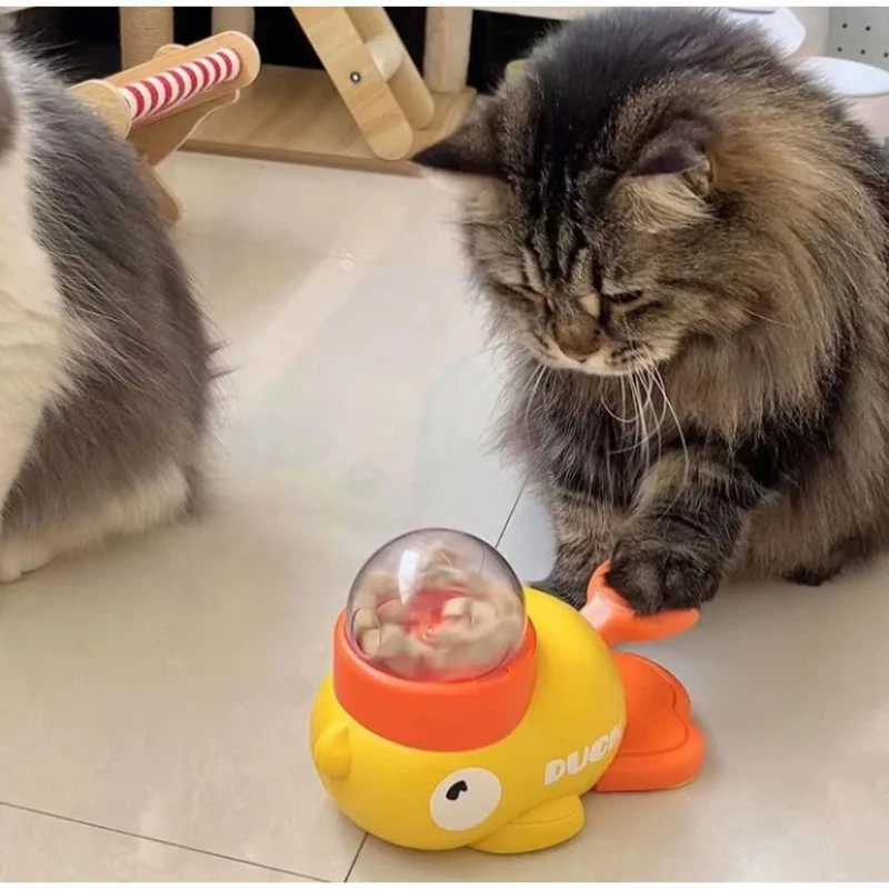 

Automatic Cat and Dog Feeder with Push Button Cat Self-Entertaining Toys Freeze-Dried Snacks and a Rubber Duck Food Dispenser