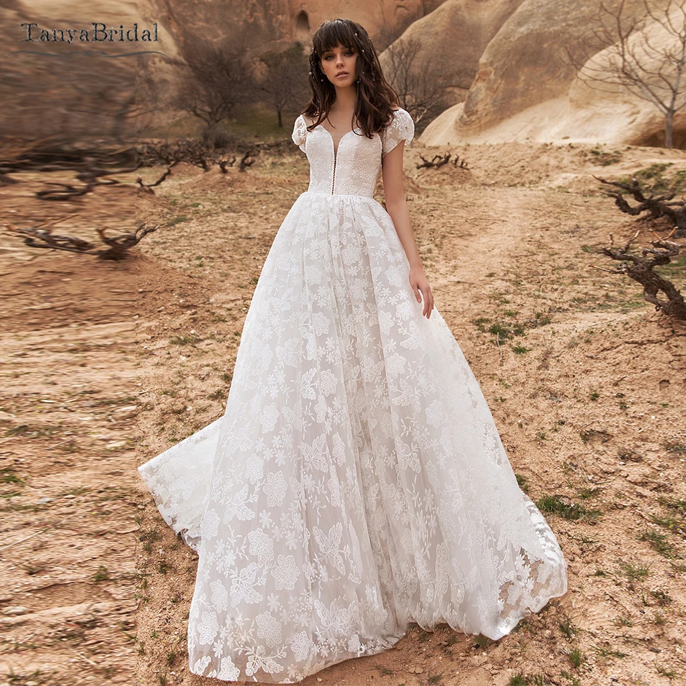 

Short Puffy Sleeve Wedding Dresses A Line Backless Princess Gowns Unique Lace Bohemian Noivas Chic DW750