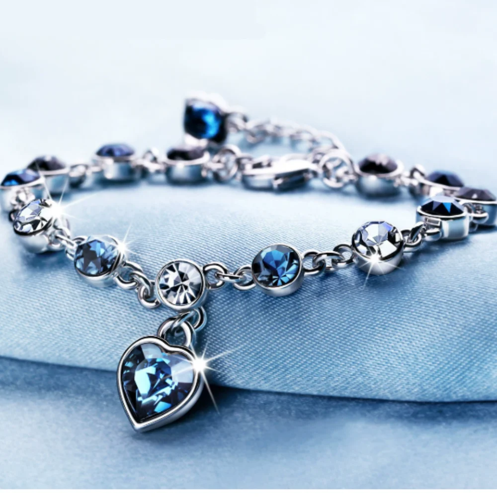 สร้อยข้อมือผู้หญิงสีเงิน สร้อยข้อมือนำโชคประดับคริสตัลสีฟ้ารูปหัวใจ สร้อยข้อมือสำหรับเจ้าสาว งานแต่งงาน งานหมั้น ของขวัญเครื่องประดับชั้นดี