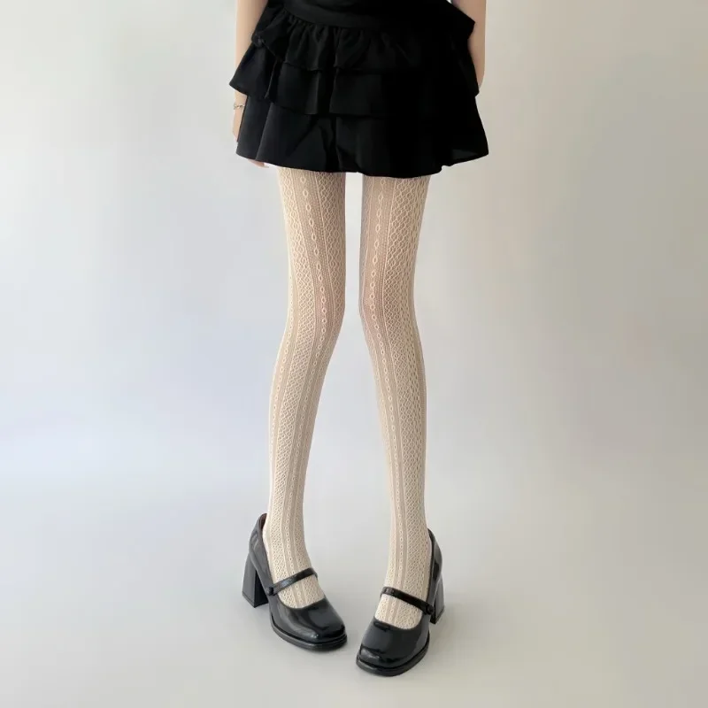 Collant a rete in pizzo a rete sexy da donna Nuovo stile Calze bianche elastiche in nylon Collant a righe verticali dolce francese scavato