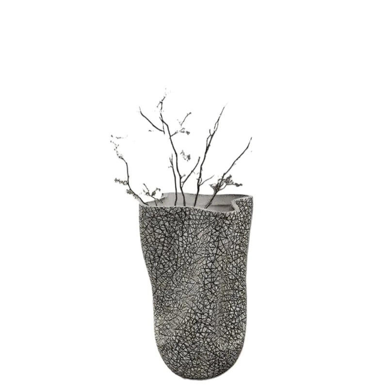 

Modern minimalist aesthetics irregular shape home decoration vase black and white resin desktop vase
