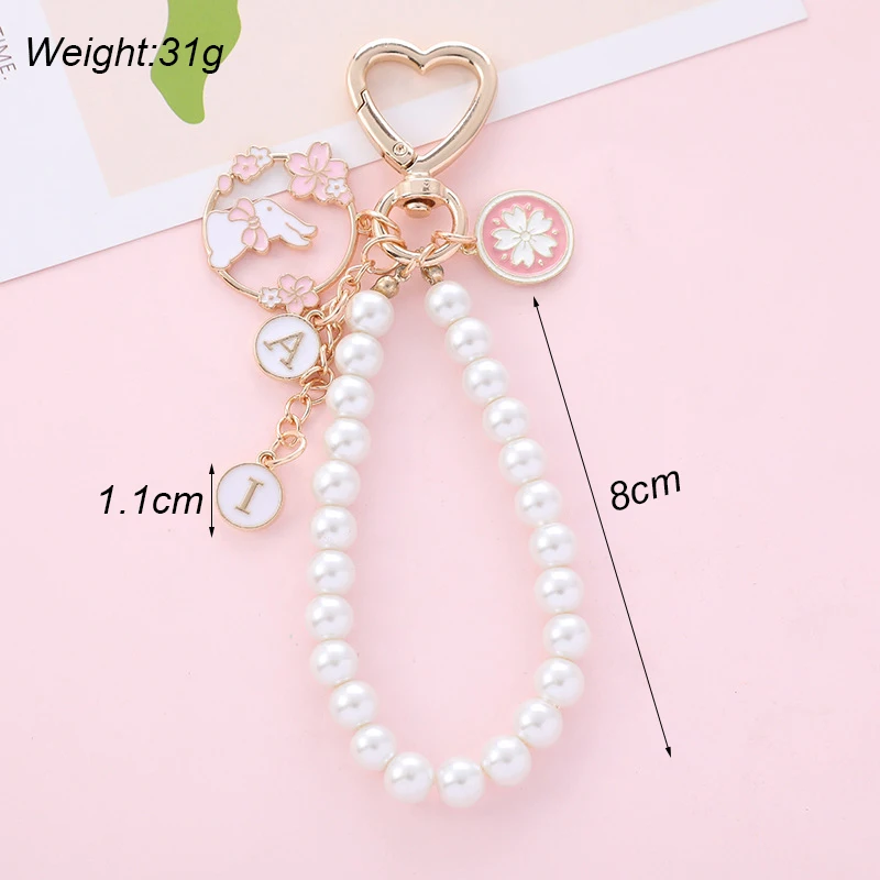 Koreanische Süße Kirschblüte Kaninchen Schlüsselbund für Frauen Kreative Gurtband Perle Schlüssel Kette Handtasche Kopfhörer Fall Anhänger Schmuck – Detail 10