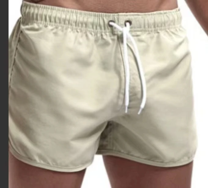 

New Summer Beach Sports Shorts Pants Men's Beach Pants Swimming Quick Dry Solid Color Tube Loose Drawstring Sports Three-point