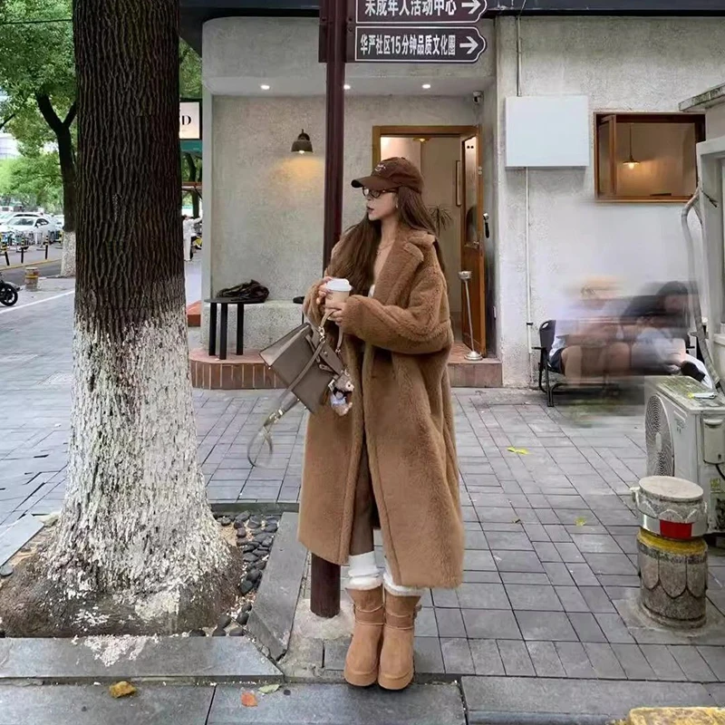 Chaqueta elegante de piel para mujer, abrigo de otoño e invierno, nuevo abrigo peludo, Parka cálida gruesa de largo medio holgado a la moda 2025