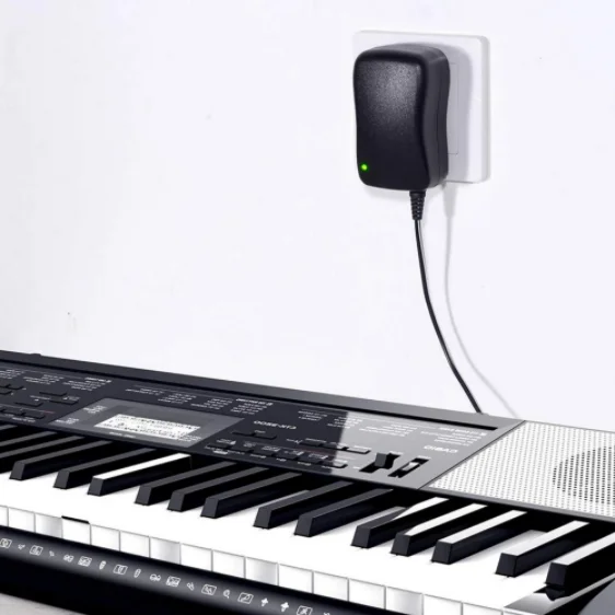 12 واط العالمي قابل للتعديل محول الطاقة شاحن التيار المتناوب إلى تيار مستمر التوصيل 3 فولت 4.5 فولت 5 فولت 6 فولت 7.5 فولت 9 فولت 12 فولت 200mA 500mA 600mA 1A عكس القطبية