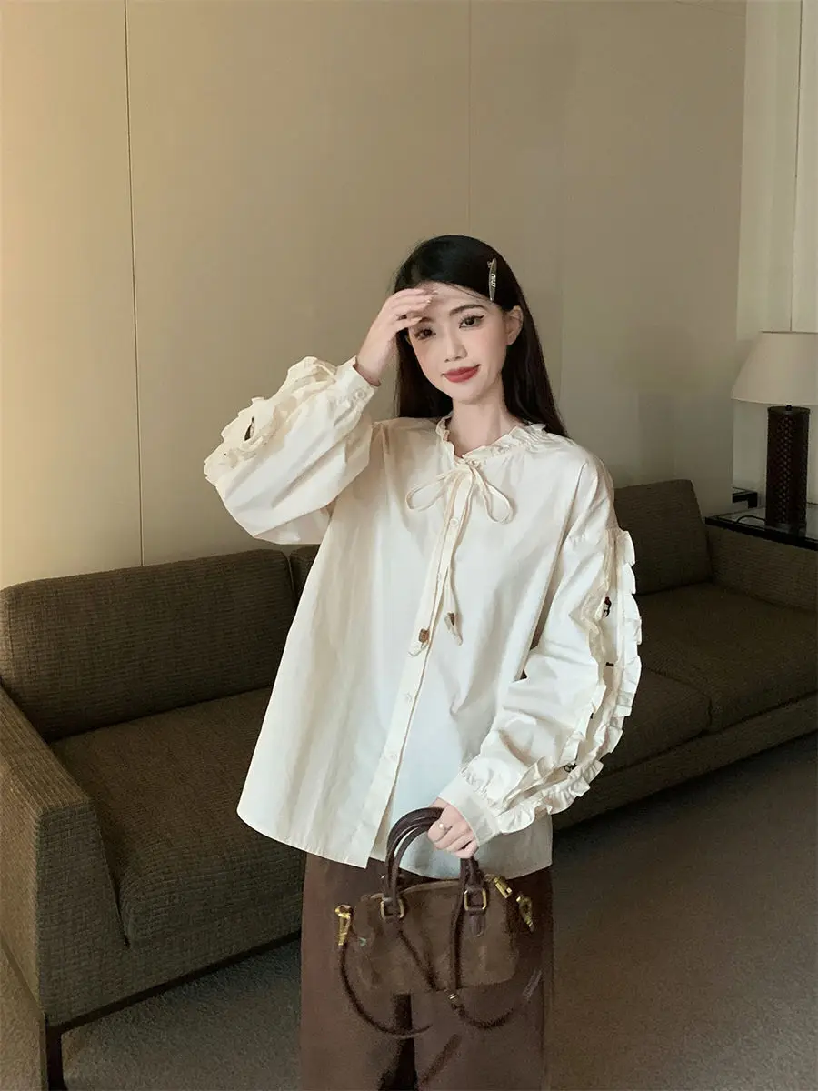 Spring and Autumn Heavy Industry Doll Head Embroidered Shirt Women\'s Temperament Bubble Sleeve Round Neck Shirt Fashion Top