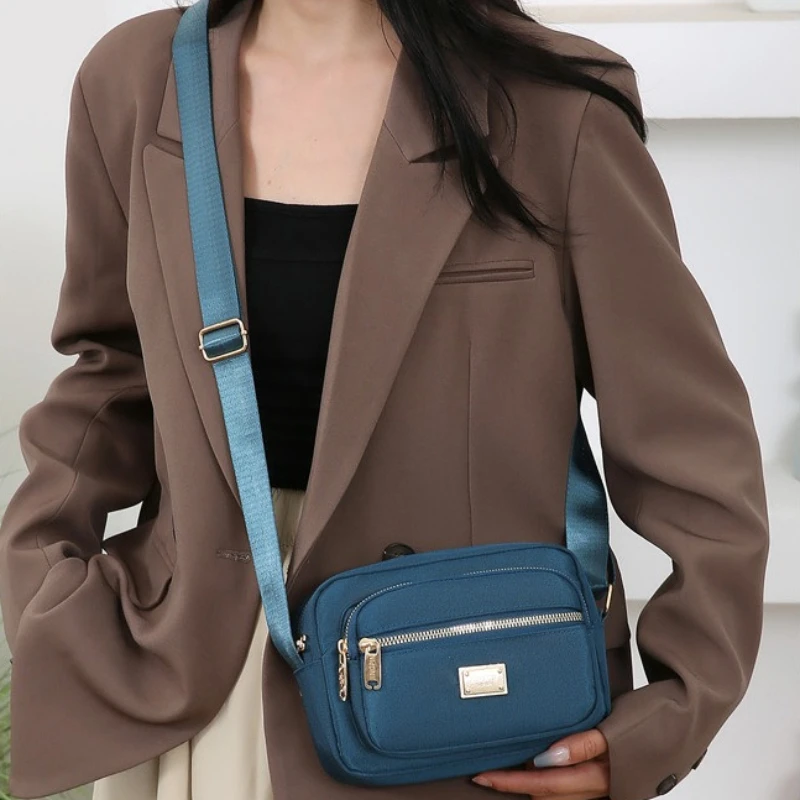 bolsa-de-ombro-pequena-portatil-para-deslocamento-bolsa-de-negocios-com-armazenamento-multicamadas-bolsa-transversal-simples-e-duravel-em-tecido-oxford