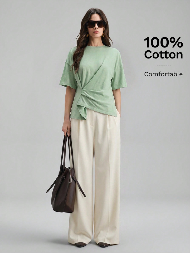  Women's holiday wear beach wear holiday spring summer new short-sleeved waist wrinkled side slit T-shirt women's irregular top 