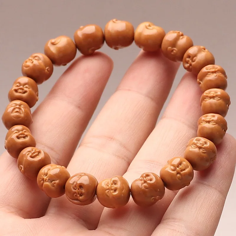 Life is full of surprises; this hand-carved monkey head and peach pit bracelet is a delightful piece of art, perfect for collect