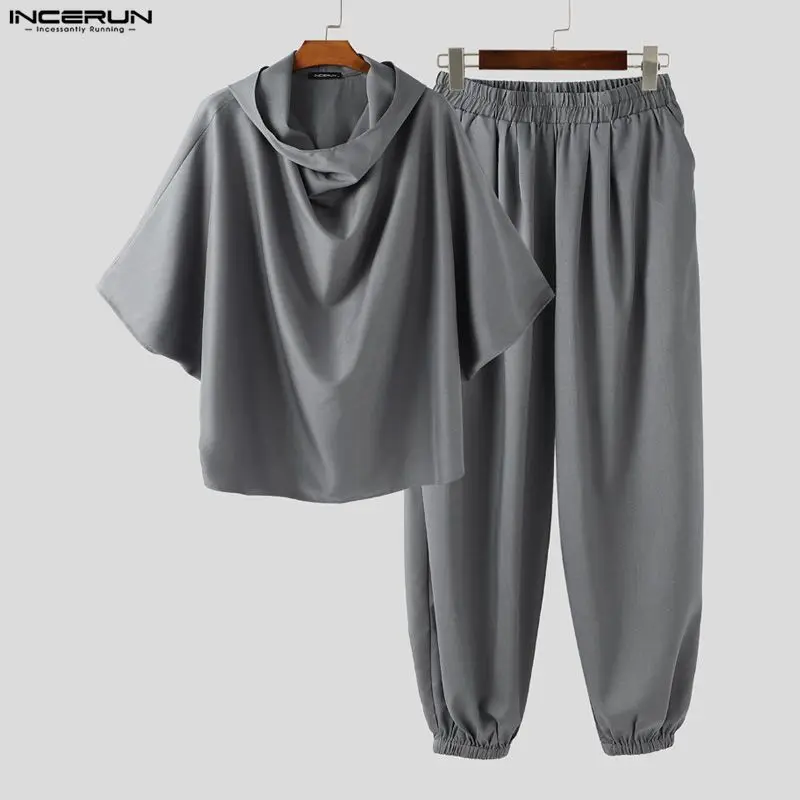 

INCERUN Мужские комплекты Однотонные свободные толстовки с капюшоном и рукавами 3/4 и брюки Комплекты из двух предметов Уличная одежда Модные мужские повседневные комплекты S-5XL