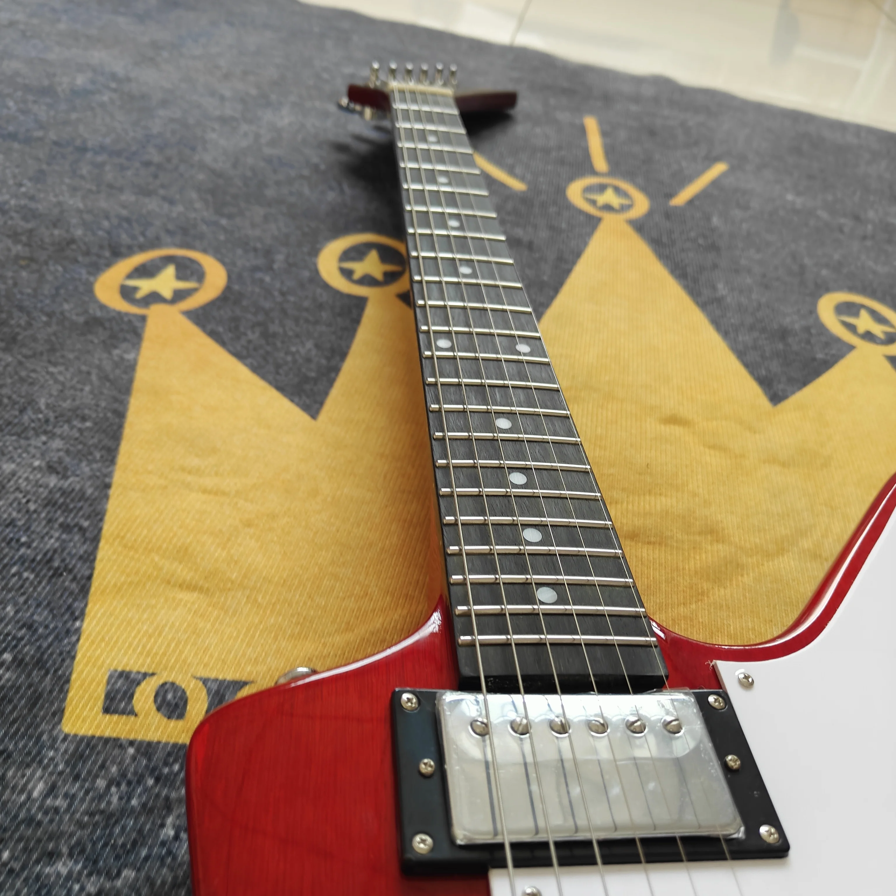 No brand, red alien-shaped electric guitar, fixed bridge with dual pickups, rock and heavy metal stage performance electric guitar, shipped from local warehouse, rock, 22 frets 6 strings