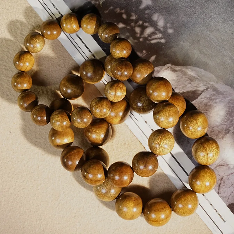 

Golden Phoebe Nanmu Water Wave Pattern Prayer Bead Bracelet Unisex Wooden Wrist Jewelry Gifts
